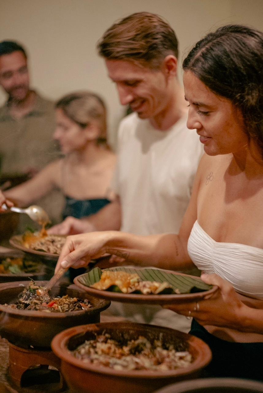 Tourists enjoying vegetarian lunch at Veda Café in Ahangama